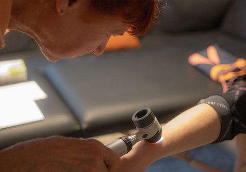 a women gets her arm screened