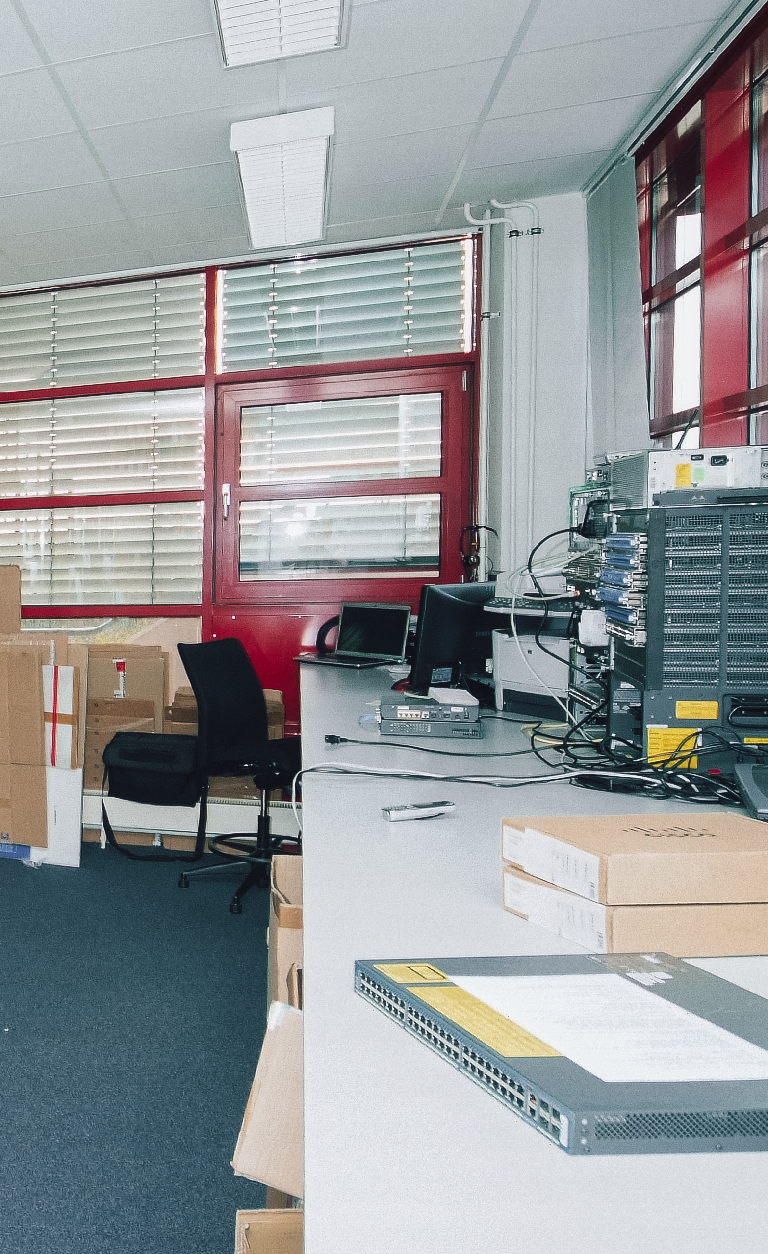 working desk of technician with chair and equipment