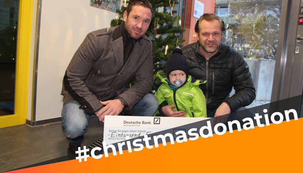 Frank Niemann & Elko Huth handing over the donation to the Magdeburg Children's Fund